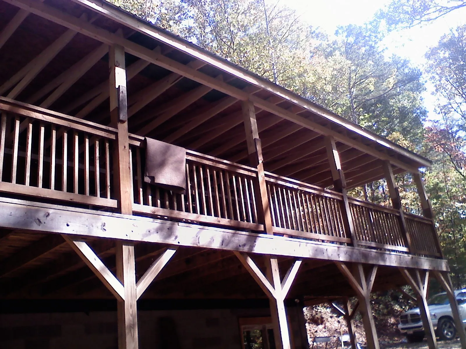 Timber framing under a new elevated porch and deck — Roof Leak Repair in Grantsville by Roofing Brothers